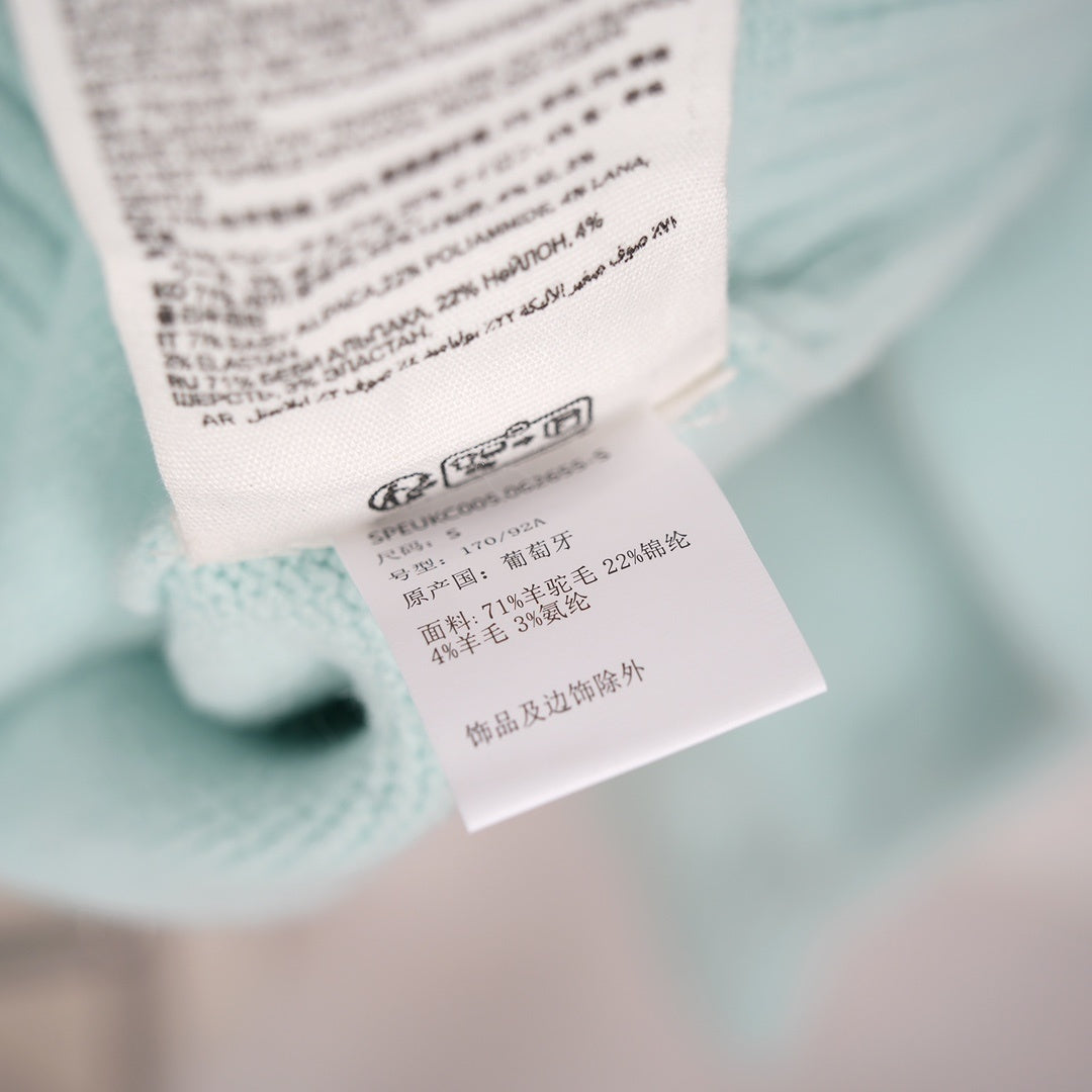 A Cloud-Themed Alpaca Wool Cardigan